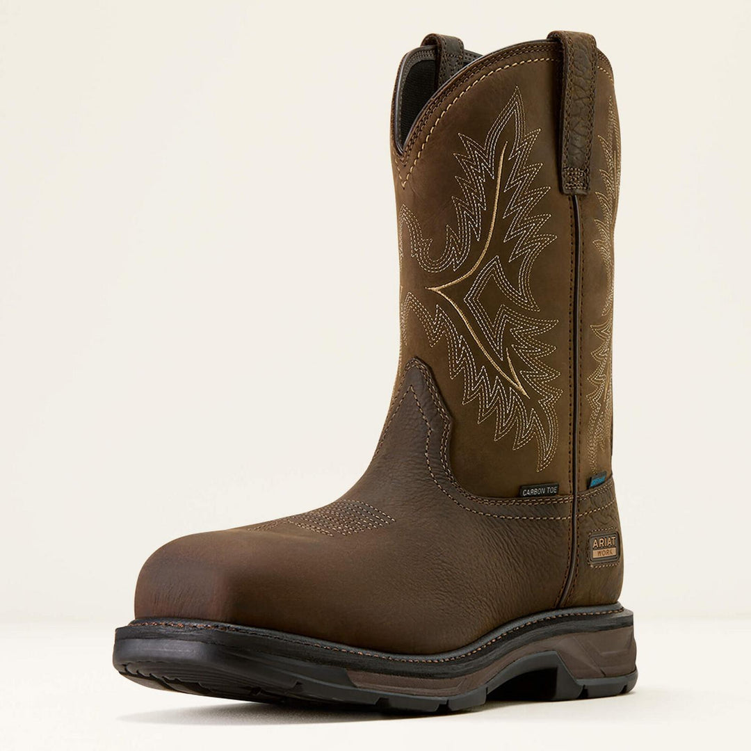 Ariat WorkHog XT waterproof pull-on work boot in distressed brown leather, three-quarter front view showing the wide square toe and pull-on straps