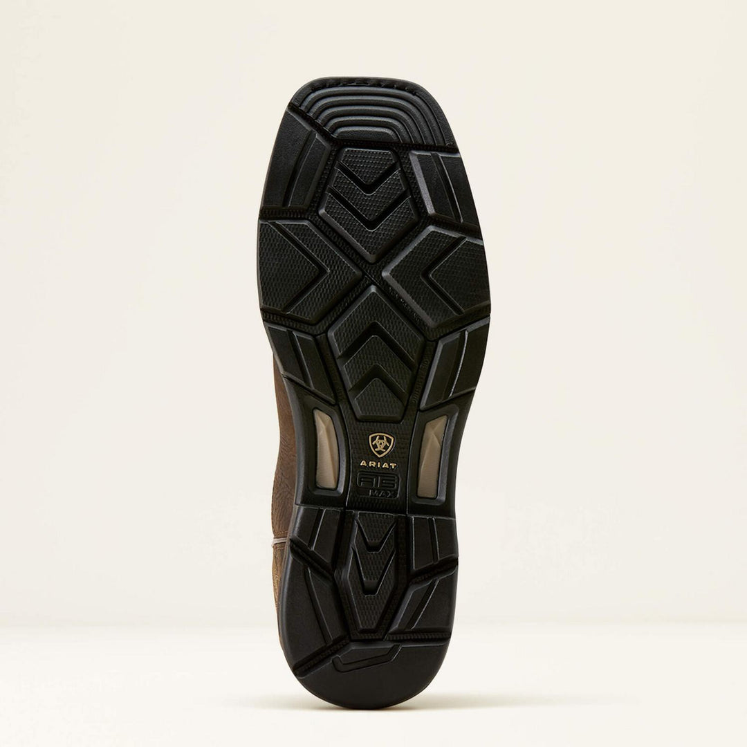 Ariat WorkHog XT outsole shown from below, black lugged rubber tread with the Ariat shield logo at the arch