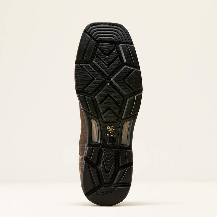 Ariat WorkHog XT outsole shown from below, black lugged rubber tread with the Ariat shield logo at the arch