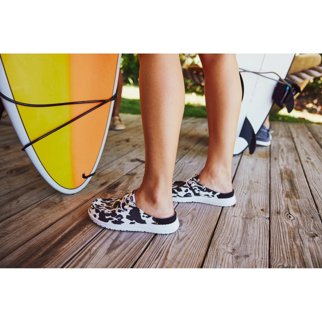 HEYDUDE Wendy Slip Classic Mule White/Black Cow Print