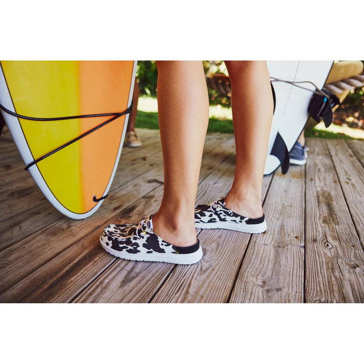 HEYDUDE Wendy Slip Classic Mule White/Black Cow Print