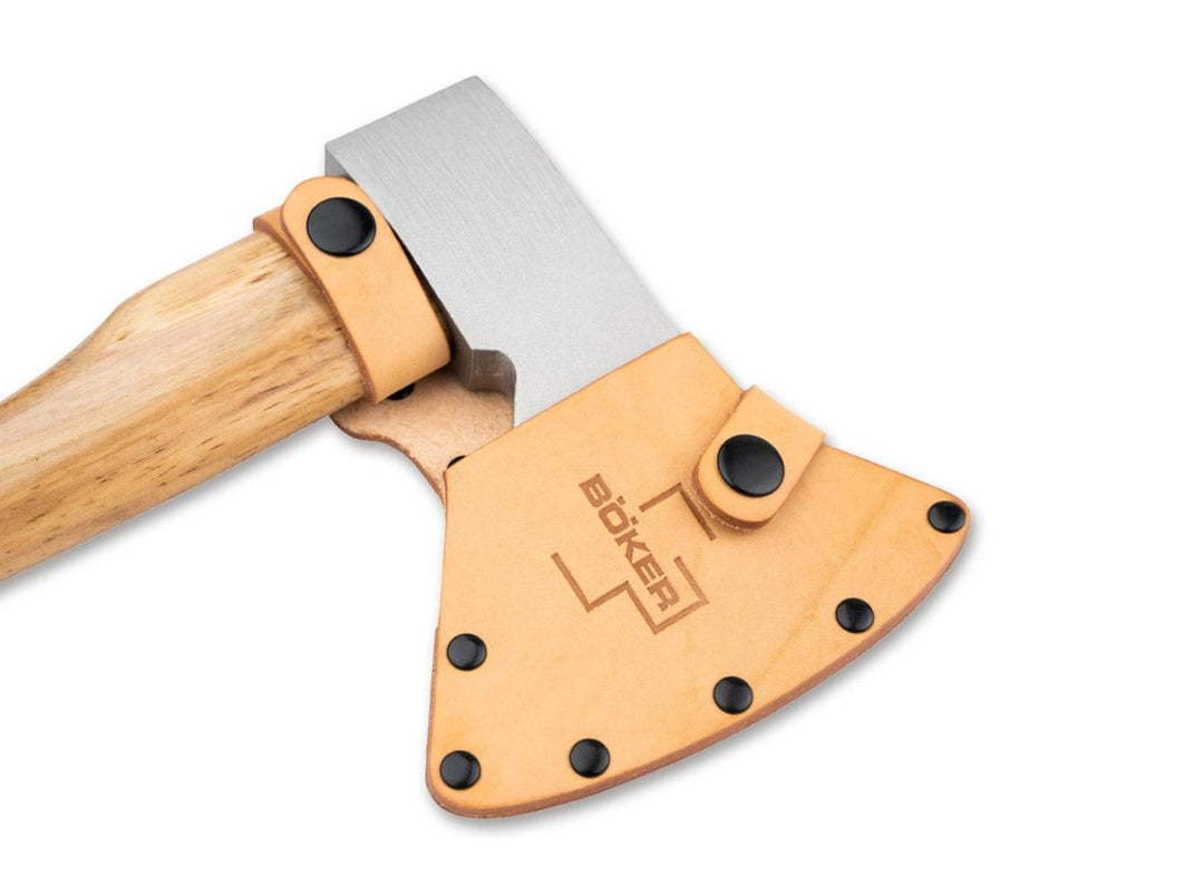 Böker Plus Appalachian axe sheath in tan leather fitted over the axe head, with the wooden handle and steel head visible