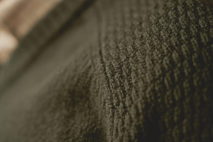 Harkila Vincent merino v-neck pullover in rosin green – view 10: close-up of the textured raglan knit shoulder