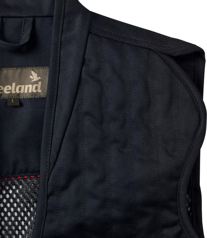 Waistcoat opened out to show the smooth twill inner shoulder panel and the woven Seeland label at the chest