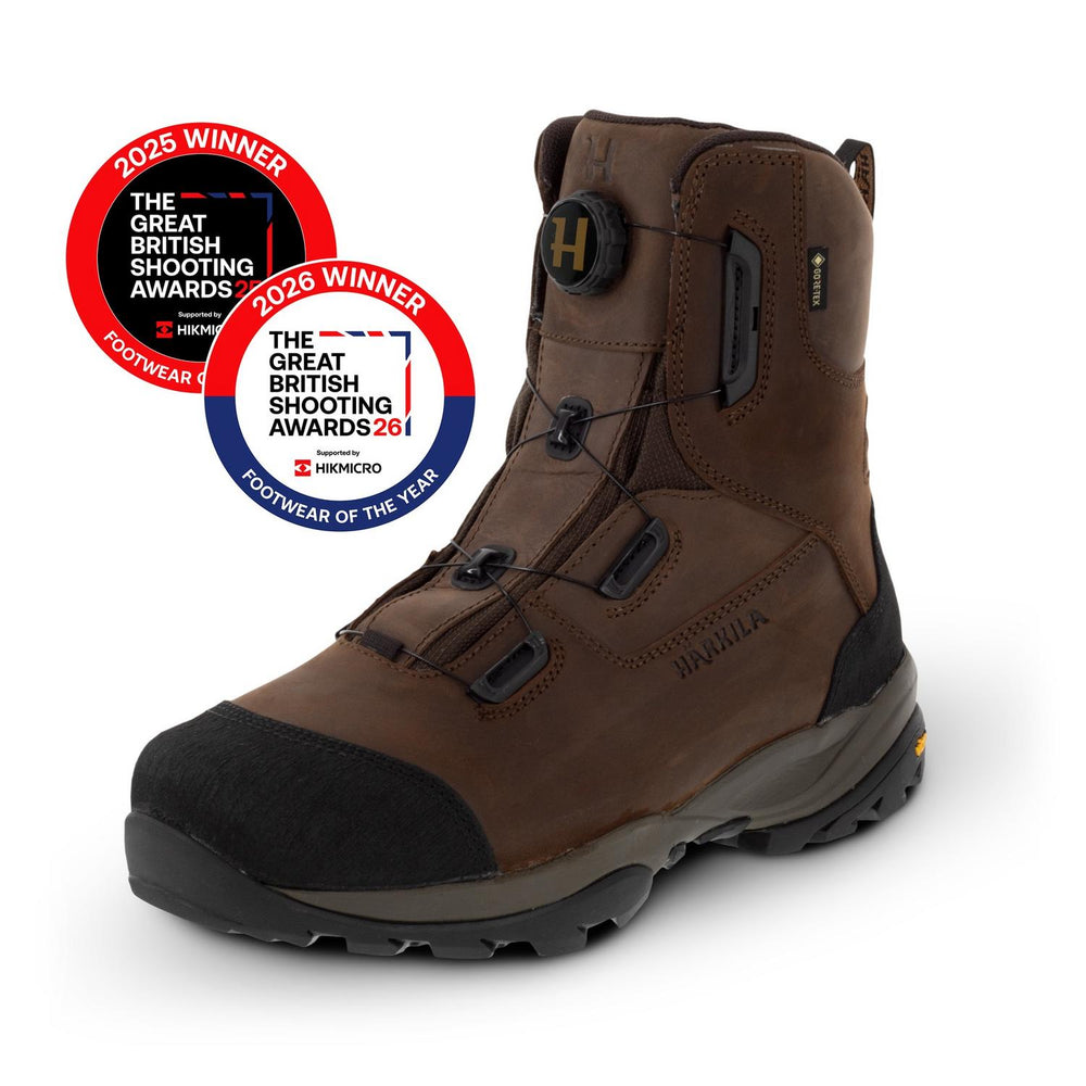 Härkila Reidmar Mid 2.0 GTX boot, three-quarter view with two award roundels overlaid: Great British Shooting Awards Footwear of the Year, 2025 and 2026 winner