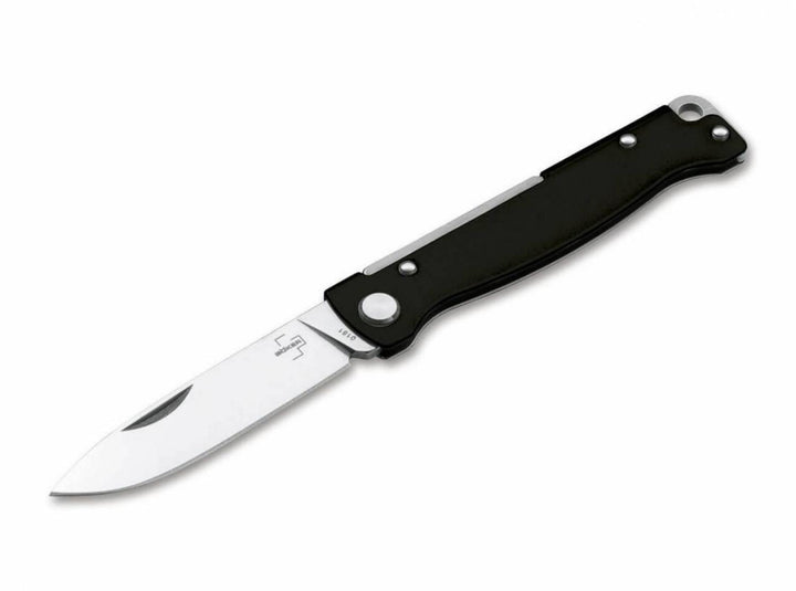Böker Plus Atlas Black folding knife open, black handle and satin drop-point blade, angled side view