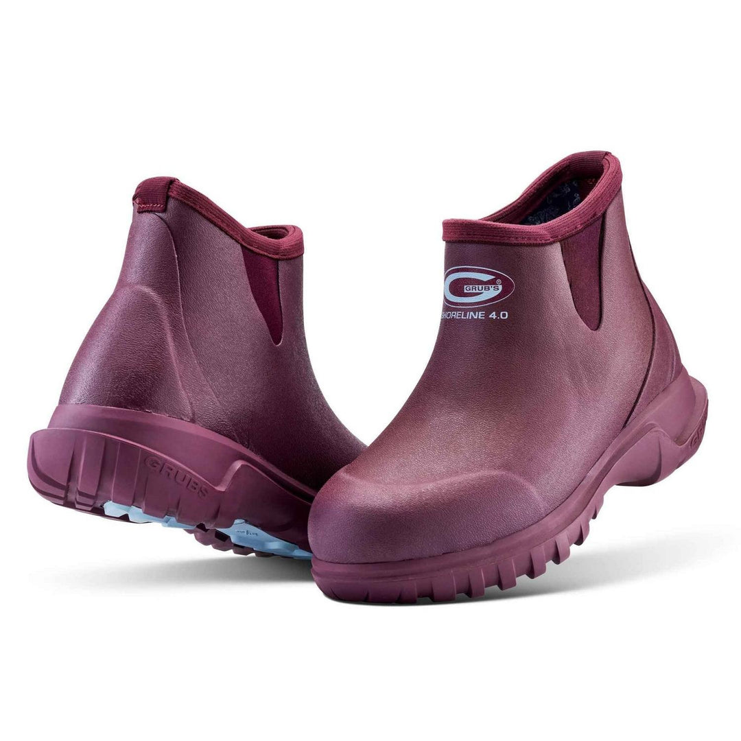 Grubs Shoreline 4.0 waterproof walking boots in burgundy, pair shown from the front three-quarter with Grubs logo on the side