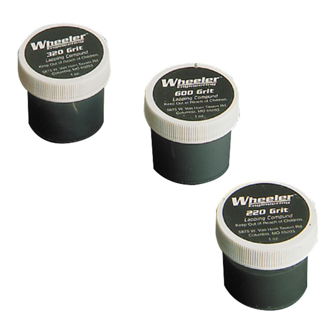 Wheeler lapping compound kit, three green and white tubs labelled 320 grit, 600 grit and 220 grit, arranged on white
