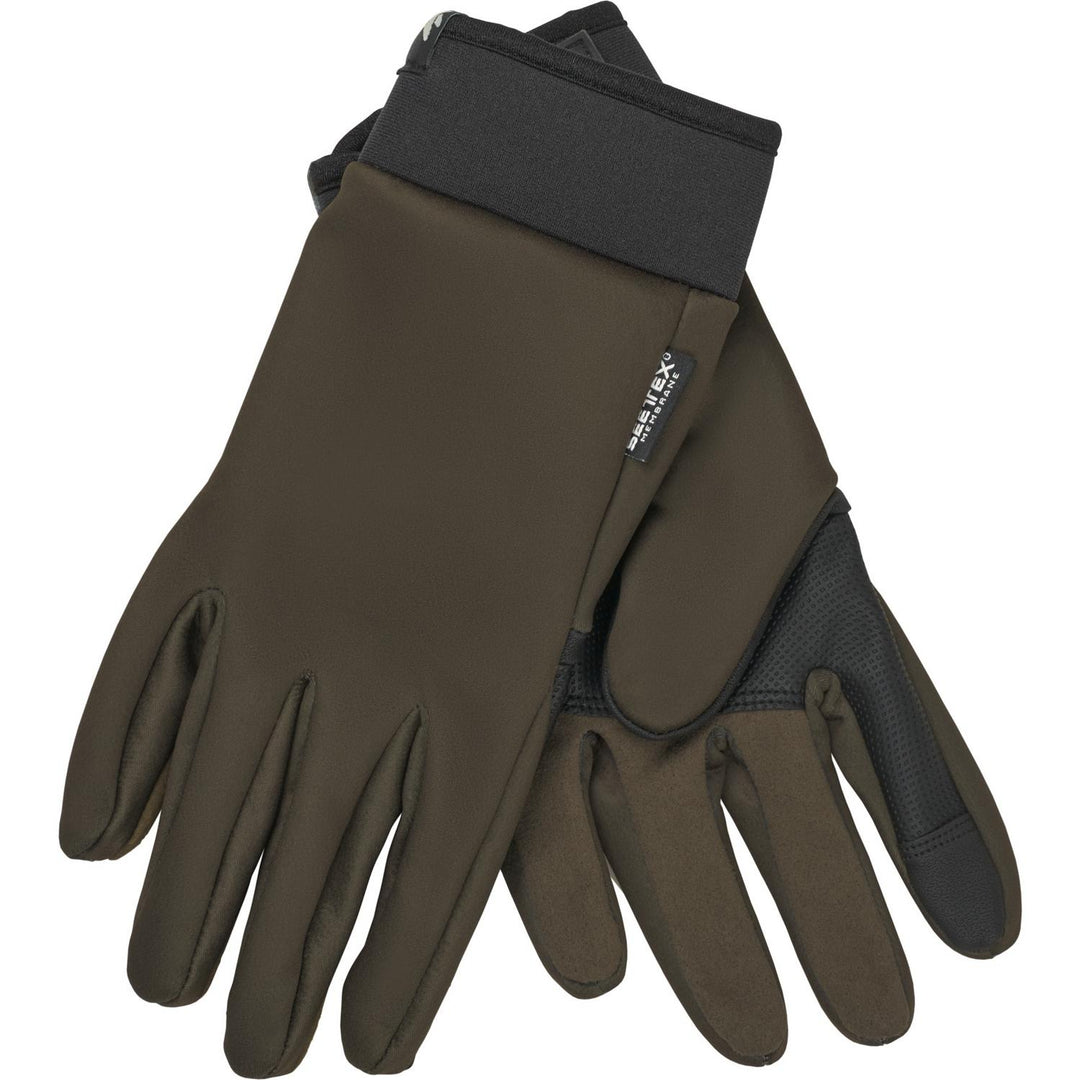 Second flat-laid shot of the pine green Seeland Target glove pair, backs up, showing the Seetex label on the cuff and the perforated touchscreen thumb patch.