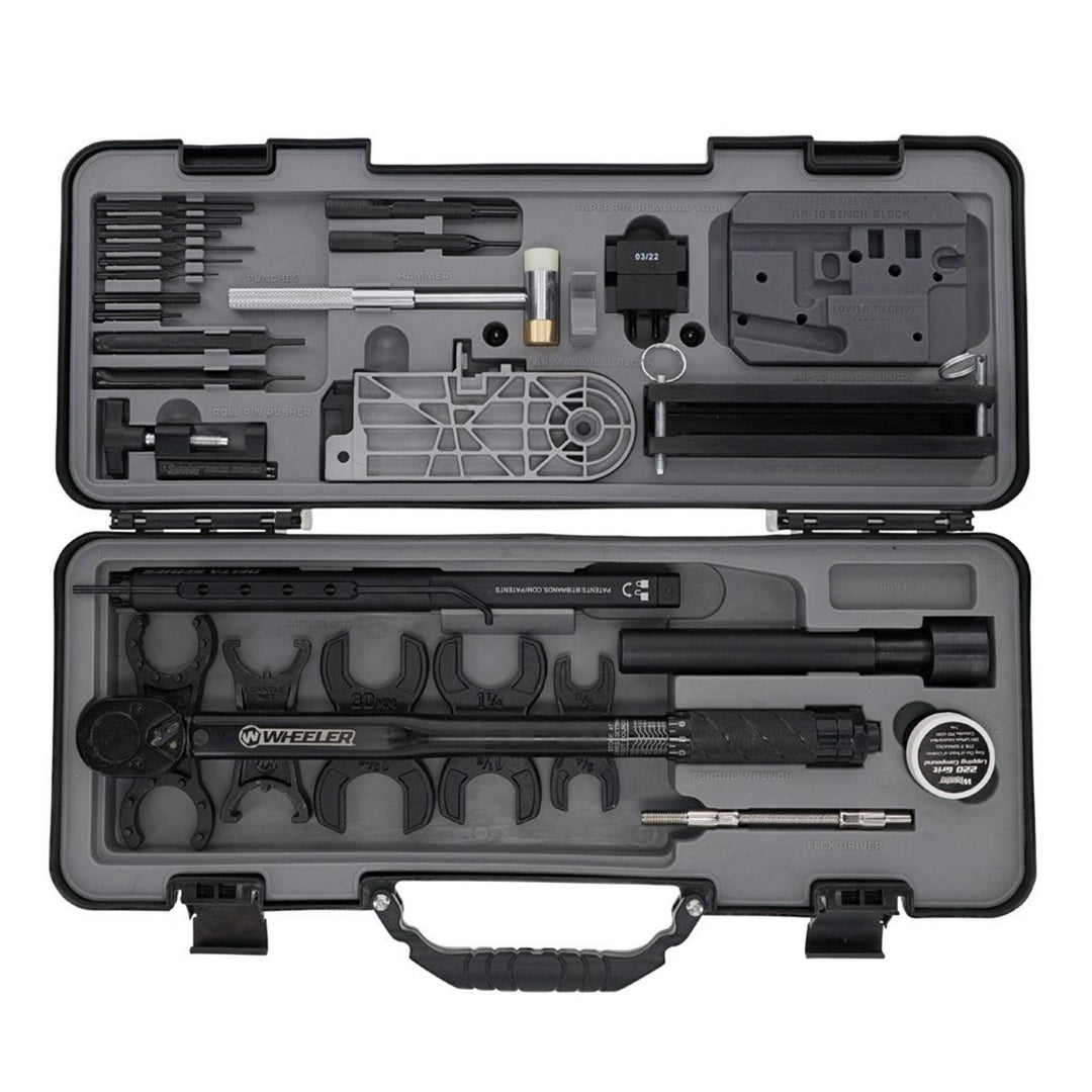 Wheeler Delta Series Pro Ultimate AR-15 armourer's kit open in its black hard case, two moulded trays holding punches, wrenches, a torque wrench and vice blocks
