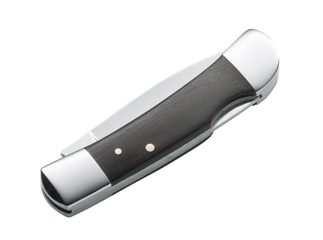 Böker Magnum Jewel folding knife closed, dark wood handle with polished steel bolsters, angled view