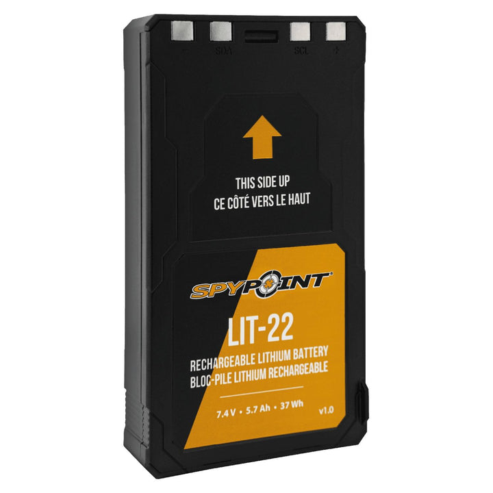 Spypoint LIT-22 battery at a three-quarter angle, showing the ribbed black casing and the orange specification label