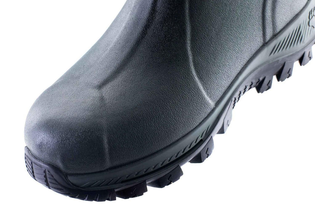 Toe and lower front of the dark grey rubber foot of the olive Grubs Bearline 8.5 wellington boot, close-up angled view