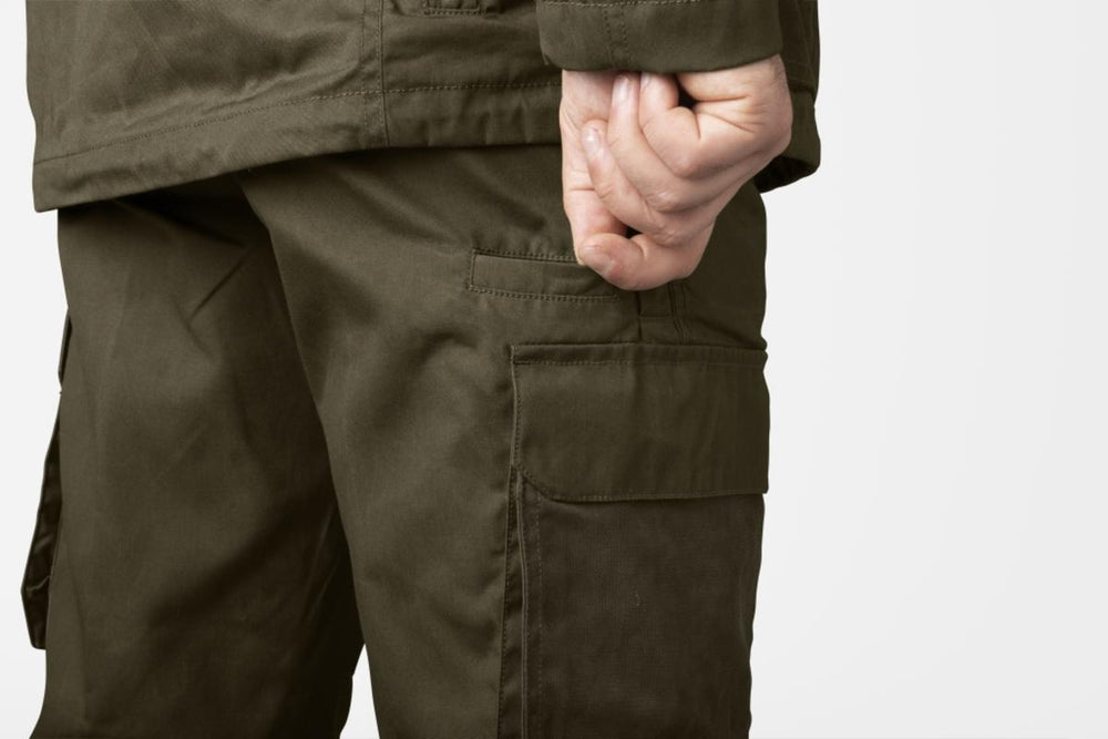 Rear three-quarter detail of the Seeland Key-Point Elements trousers on a model, showing the seat and the flapped back pocket.