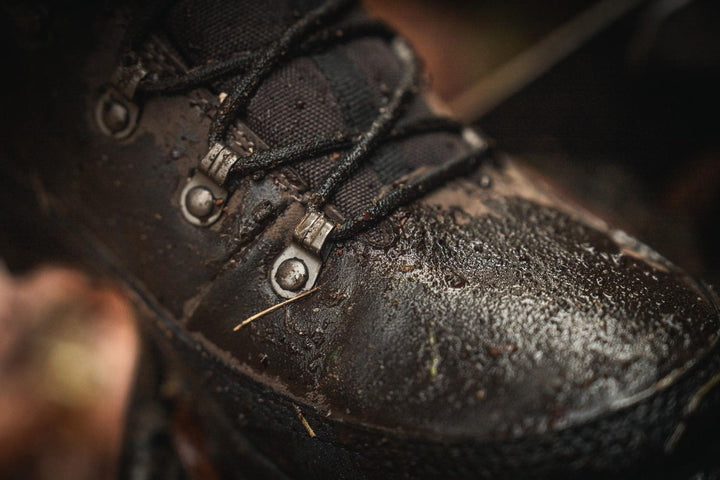 Close-up of the wet, muddy toe of the Seeland Enduro Explore Mid boot