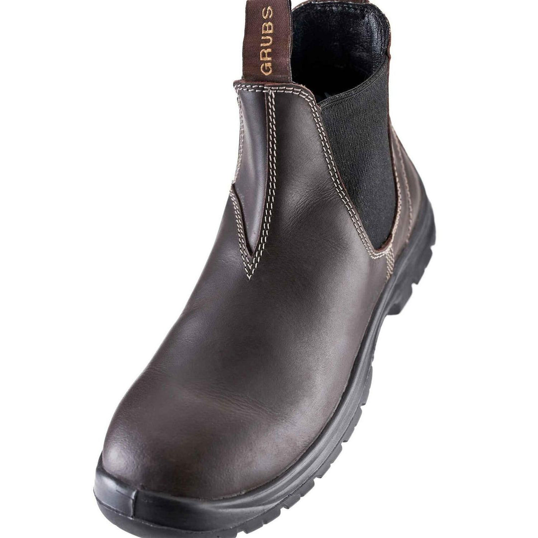 Grubs Tempest brown leather dealer boot, side view showing stitching, elastic panel and black sole