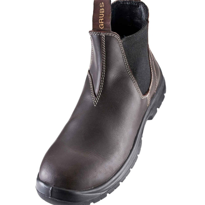 Grubs Tempest brown leather dealer boot, side view showing stitching, elastic panel and black sole