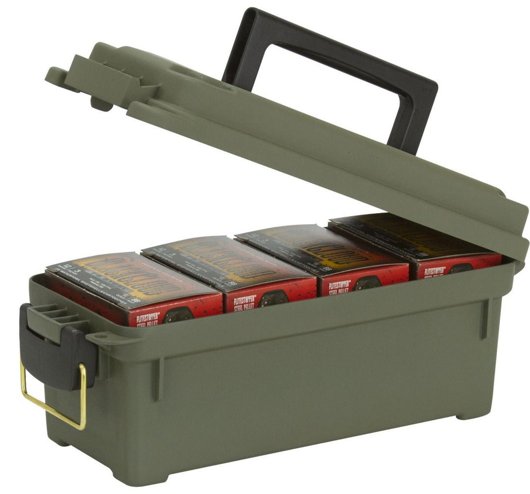 Plano Shot Shell Box in olive green plastic with a black carry handle and brass latch, lid raised to show four red boxes of shotgun cartridges packed inside.