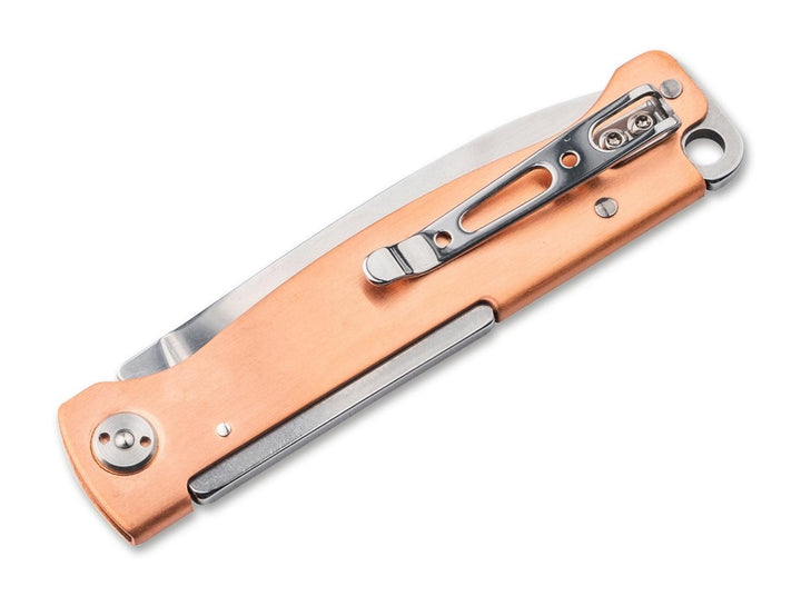 Böker Plus Atlas Copper folding knife closed, copper handle with pocket clip, angled view