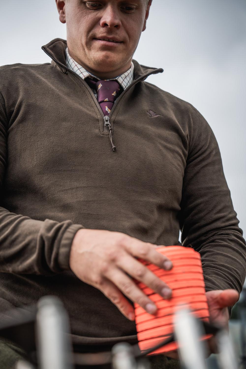 Seeland Benjamin Half Zip Fleece Pine – view 10: close-up over-the-shoulder shot of a man wearing the fleece, chin and collar in frame