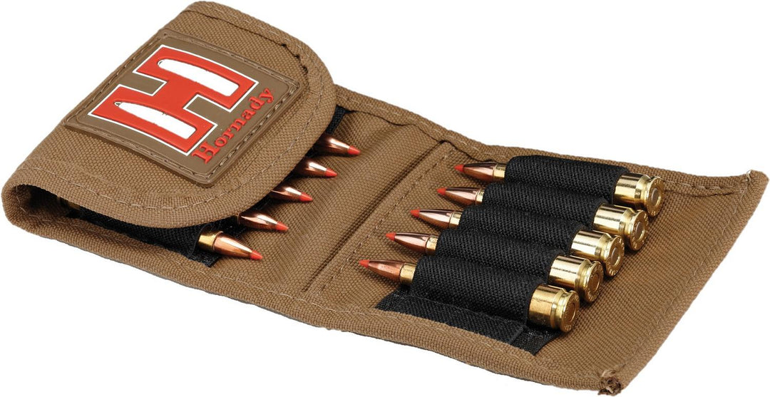 Hornady tan ammo pouch opened out flat, showing rifle cartridges held in the elastic loops inside both halves.