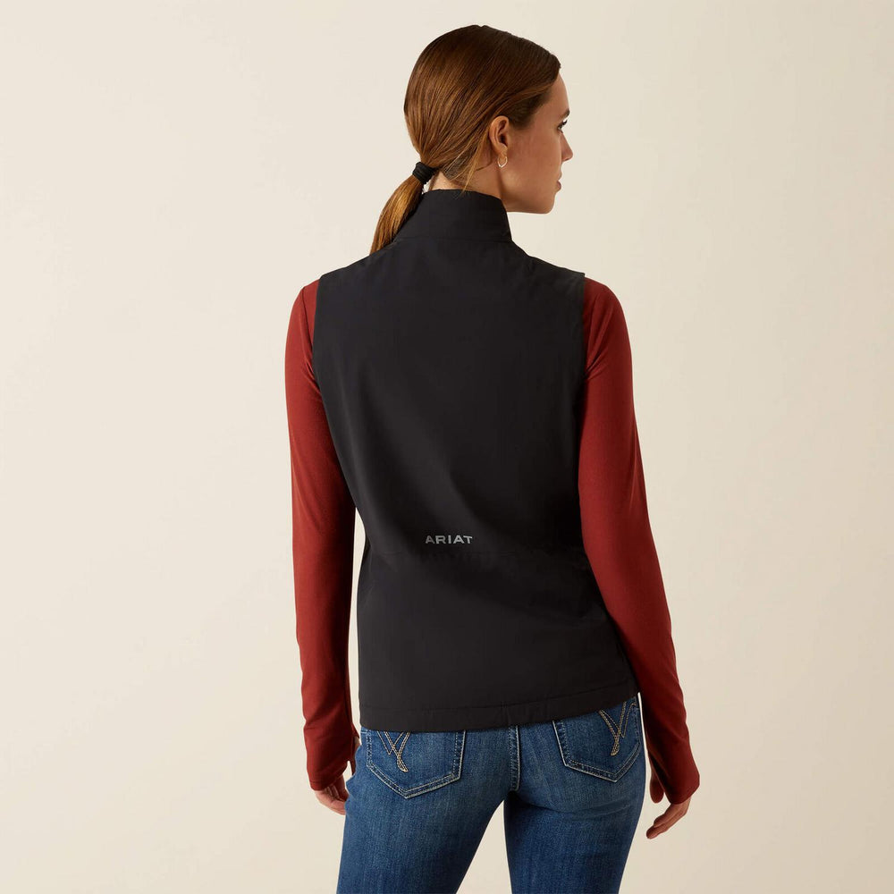 Ariat Ladies Rion StretchShell insulated gilet in black, rear view on a model showing the Ariat wordmark at the lower back