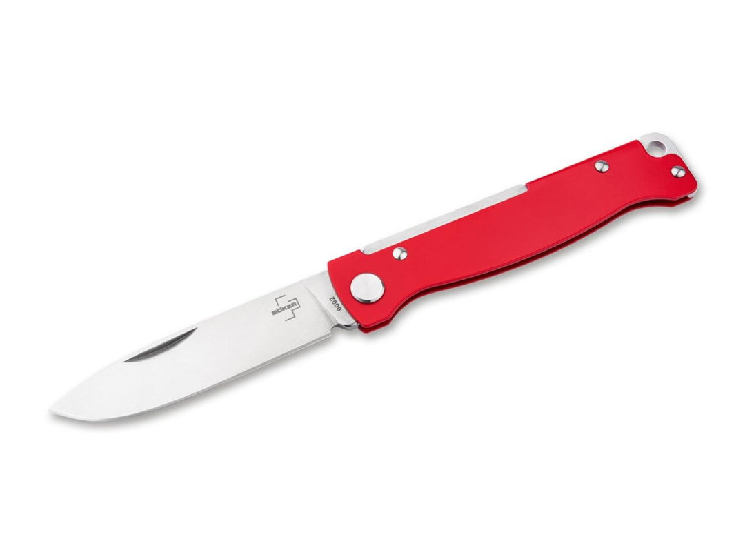 Böker Plus Atlas Red folding knife with red aluminium handle and satin drop-point blade open, side view on white