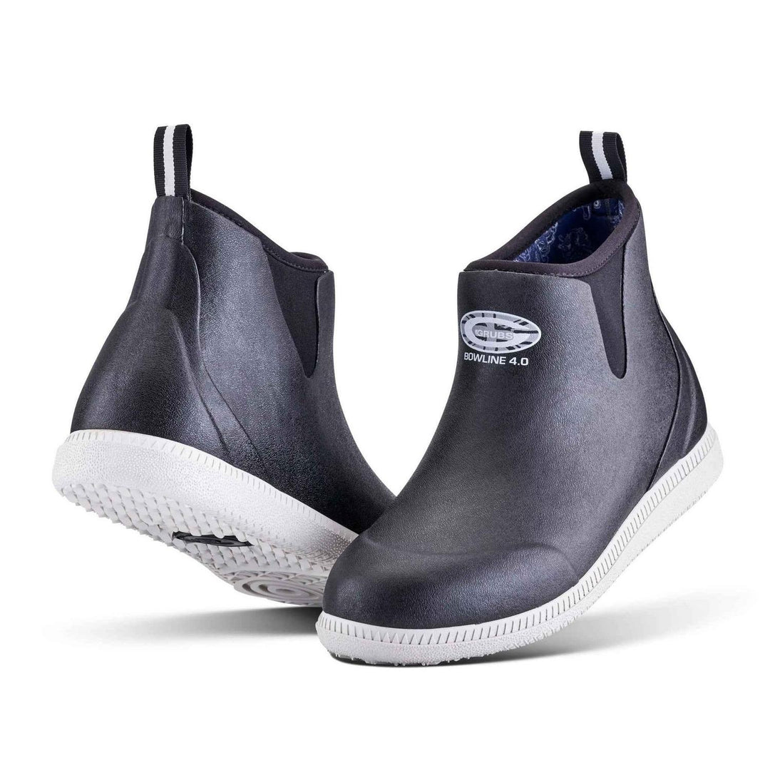 Grubs Bowline 4.0 insulated ankle wellington boots in black with white sole, pair shown from the front three-quarter