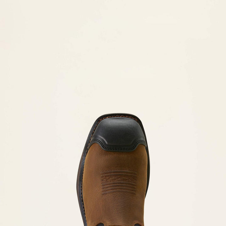 Top-down view of the Ariat WorkHog XT square toe showing the black rubber toe guard over brown leather