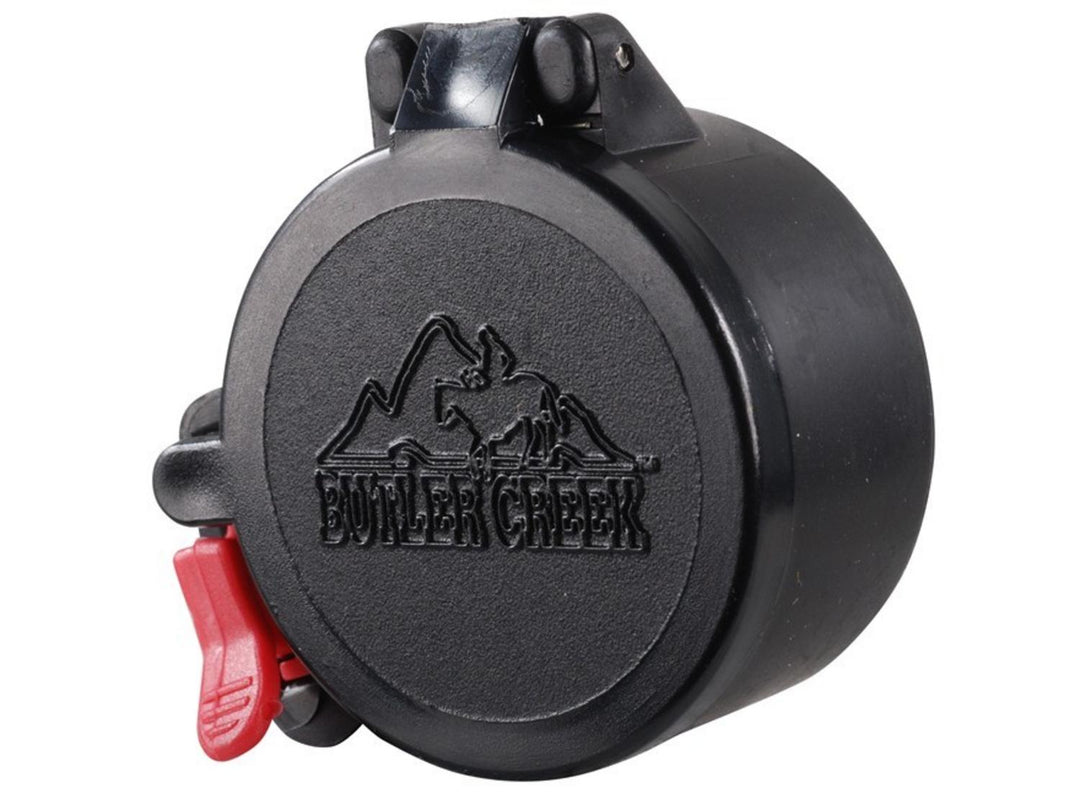 Butler Creek Flip-Open scope cover, black hinged lens cap embossed with the Butler Creek mountain logo and a red flip-open tab, three-quarter view