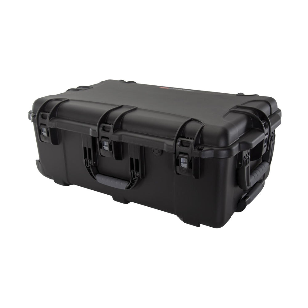 NANUK 963 hard case closed, three-quarter view showing the lid profile, side latches and carry handle.