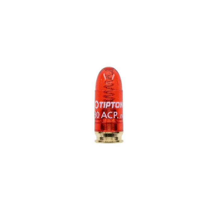 Tipton .380 ACP snap cap, short translucent red dummy pistol round with a brass base, standing upright with Tipton 380 ACP printed on the case