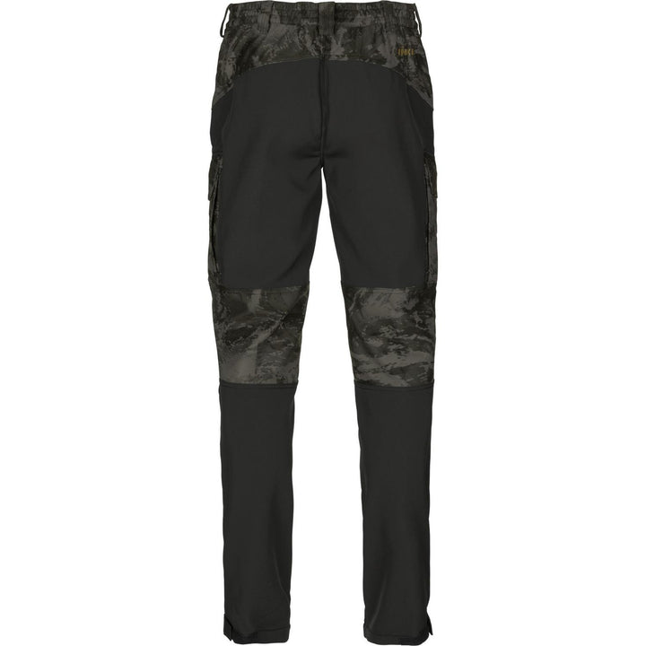 Rear view of the NOCTYX trousers showing the black seat reinforcement, rear cargo pockets and camo waistband