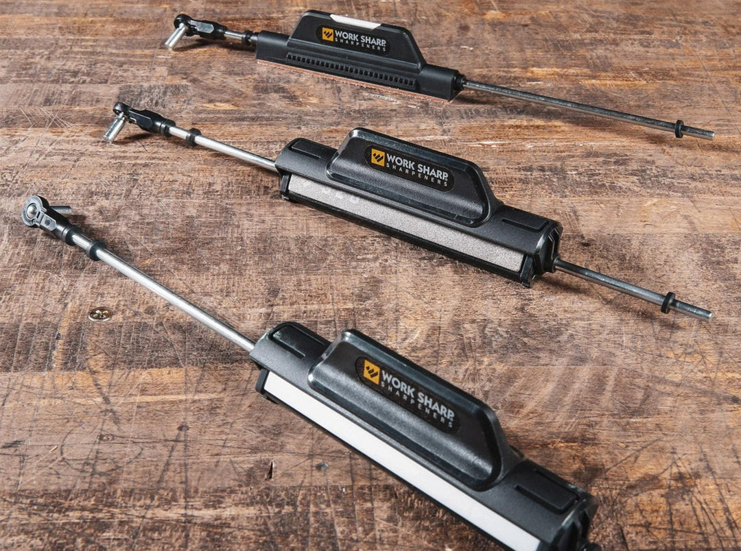 Work Sharp Precision Adjust Elite diamond sharpening rods lined up on a wooden bench