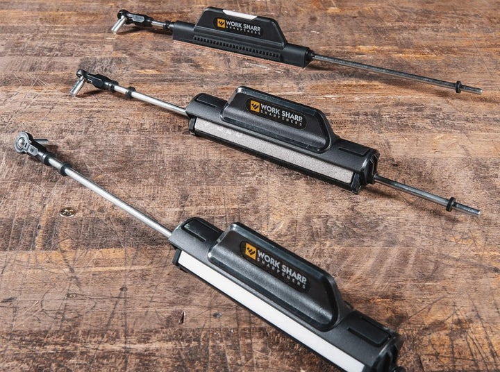 Work Sharp Precision Adjust Elite diamond sharpening rods lined up on a wooden bench