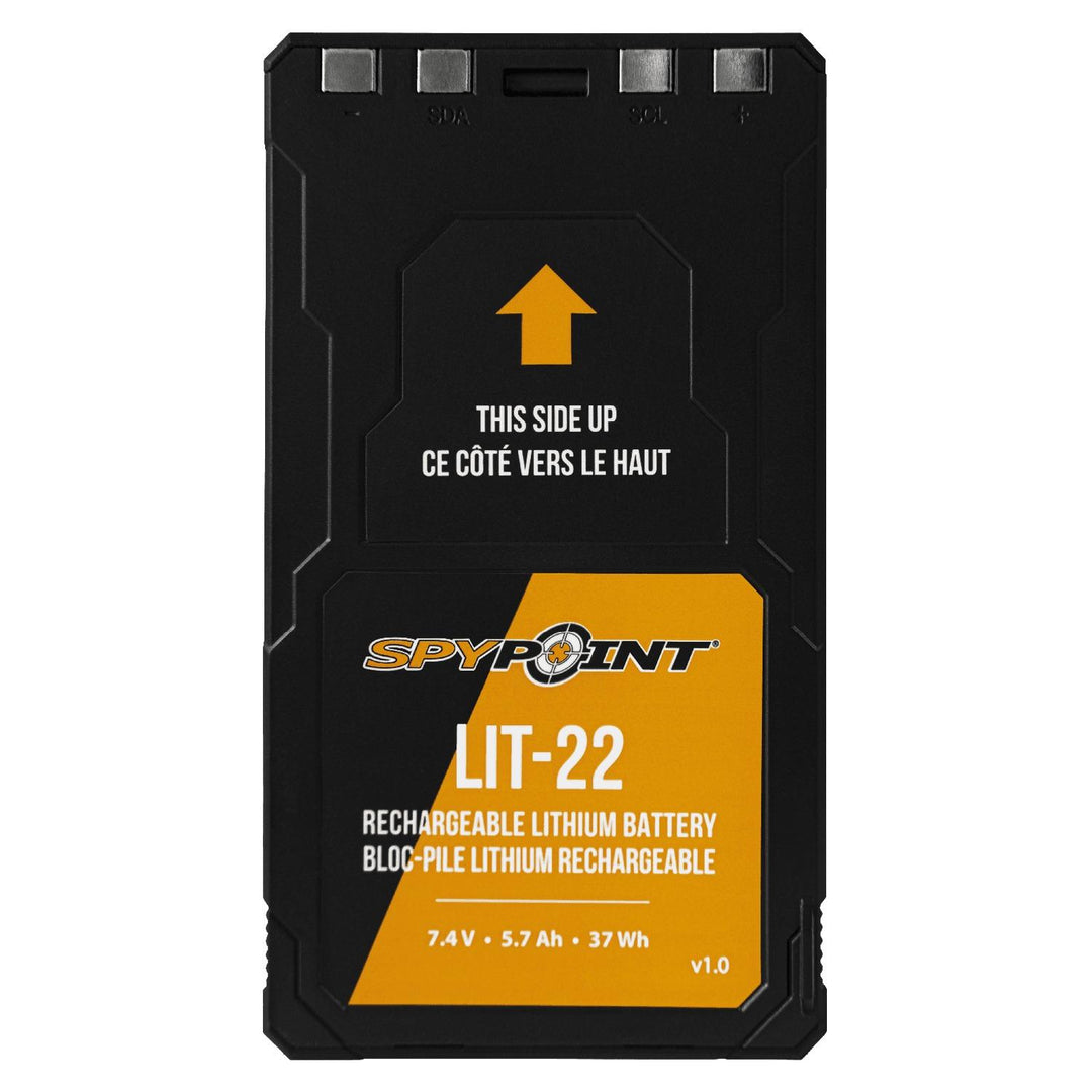 Spypoint LIT-22 battery viewed from above, showing the metal contact terminals along the top edge and the orange label below