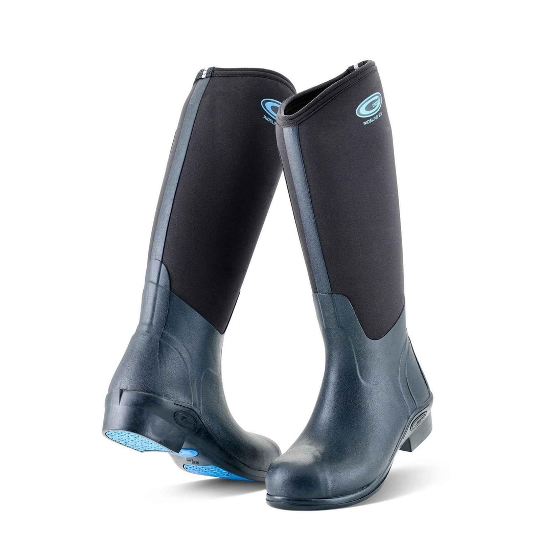 Grubs Rideline 5.0 women's riding wellington boots in black and dark grey neoprene, pair shown from the front three-quarter with blue sole accents