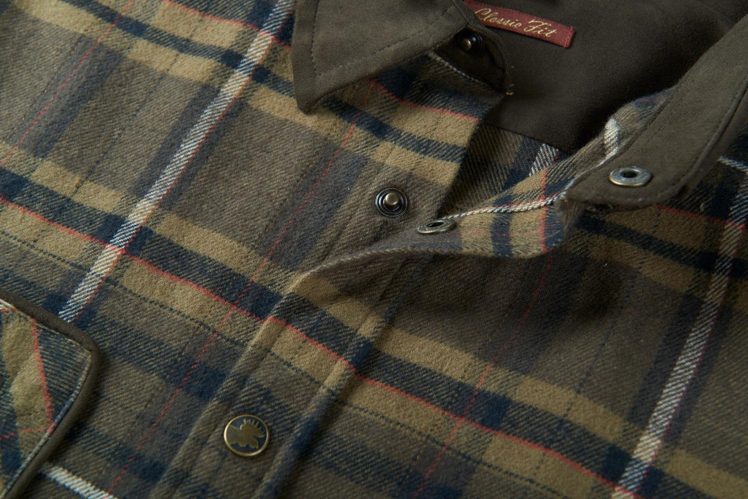 Detail of the Harkila Pajala shirt neck opening, showing the press-stud placket, inner Modern Fit label and the check flannel weave.