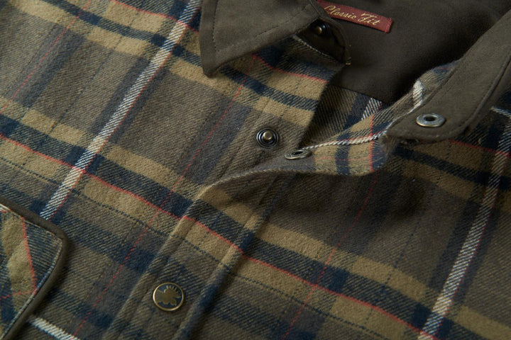 Detail of the Harkila Pajala shirt neck opening, showing the press-stud placket, inner Modern Fit label and the check flannel weave.