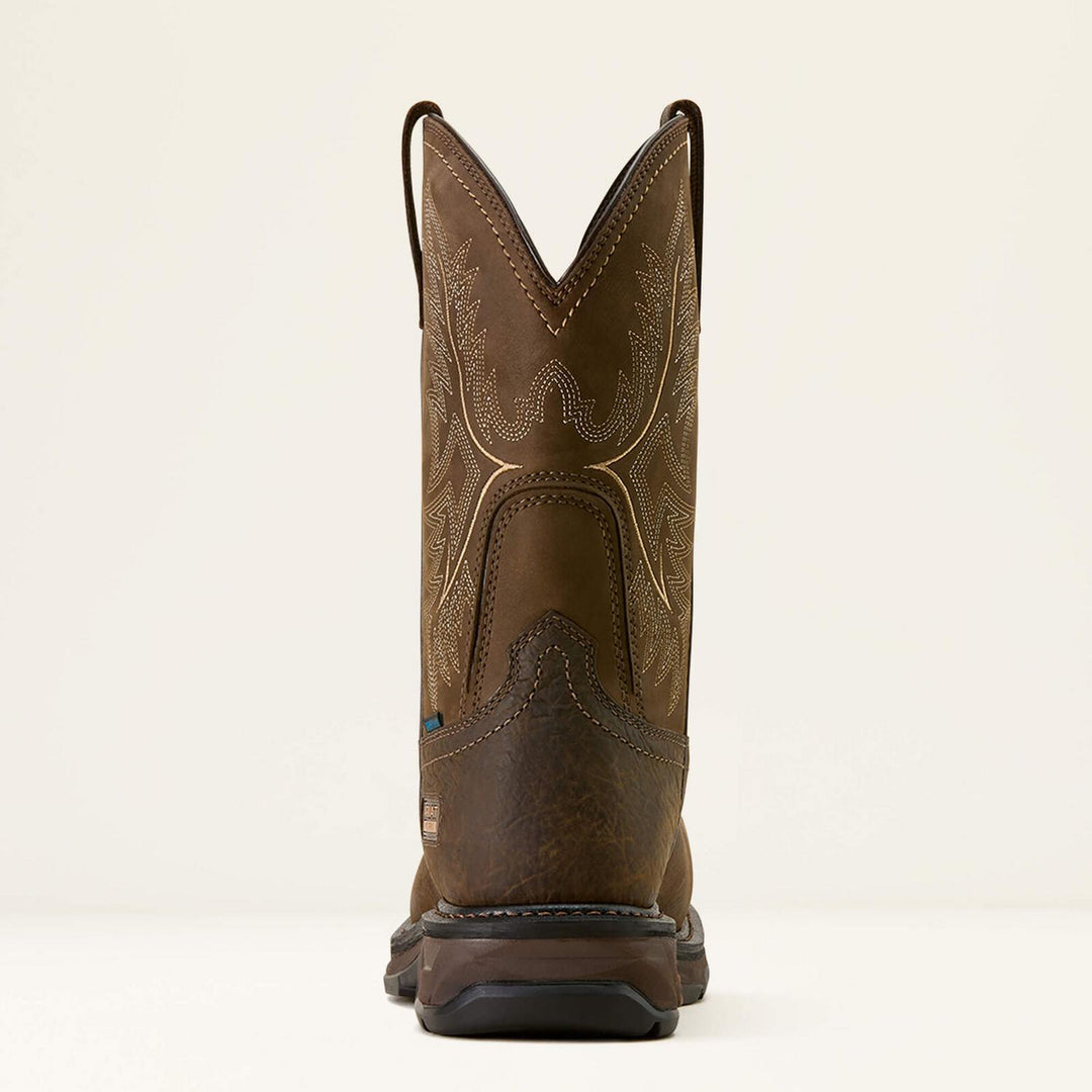 Ariat WorkHog XT boot viewed from the rear, showing the V-notch shaft and cream stitching on brown leather