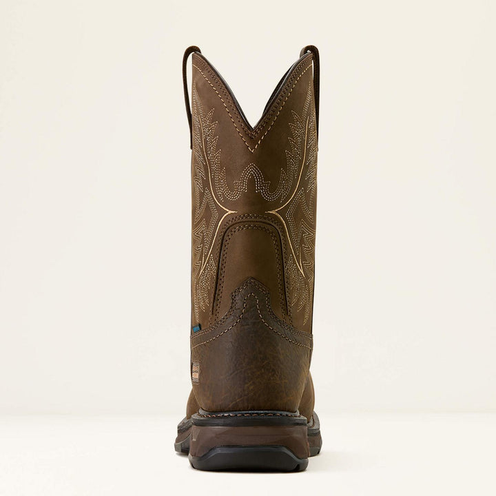 Ariat WorkHog XT boot viewed from the rear, showing the V-notch shaft and cream stitching on brown leather