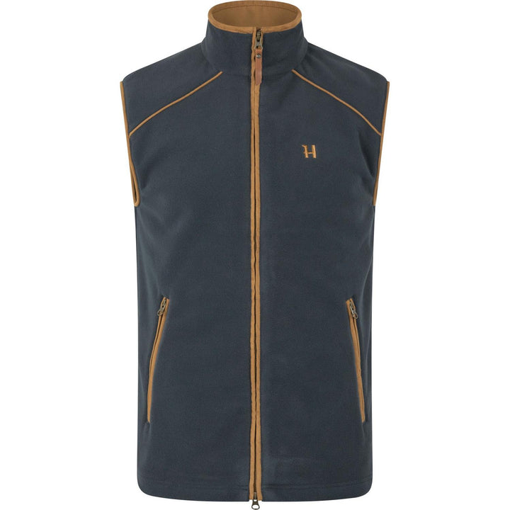 Härkila Sandhem 200 fleece waistcoat in dark navy, front view showing the tan-piped shoulder seams and copper H logo on the chest