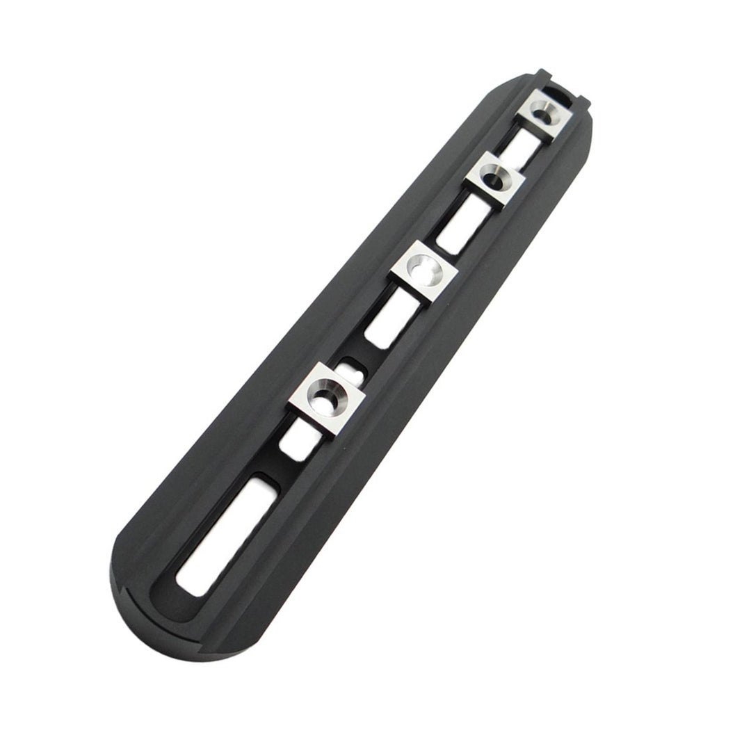 Nieload Sako TRG 42/22 ARCA M-LOK front rail, black slotted rail with silver M-LOK fixing nuts fitted, shown at an angle