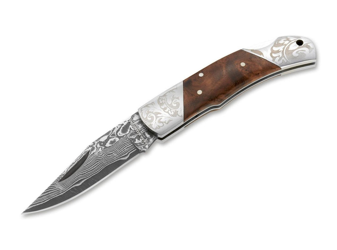 Böker Magnum Damascus Duke folding knife with burl wood handle, engraved steel bolsters and Damascus blade, open side view