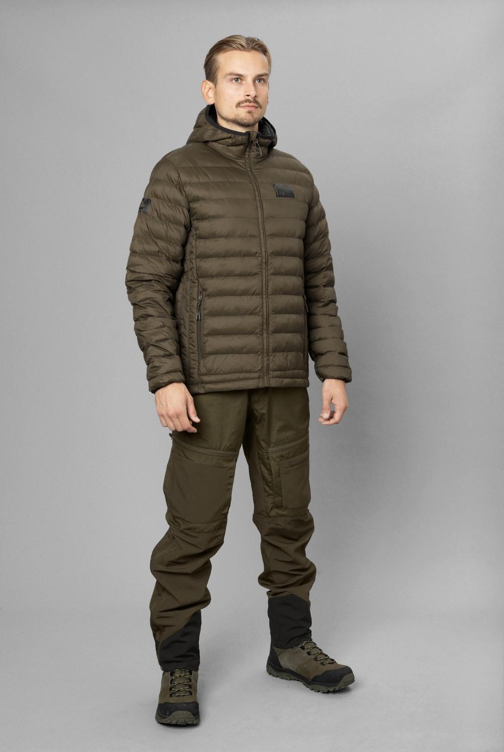 Man wearing the Seeland Fahrenheit jacket with matching trousers and boots, full-length front view