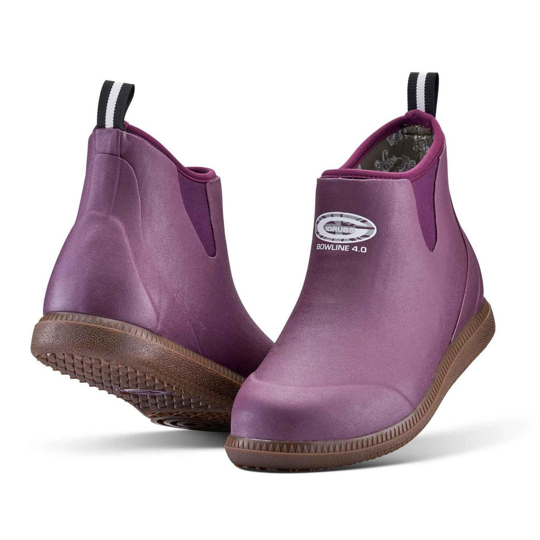 Grubs Bowline 4.0 insulated ankle wellington boots in purple with brown sole, pair shown from the front three-quarter