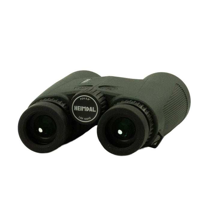 Heimdal binoculars in olive-green rubber armour, viewed from above showing both eyecups, the central focus wheel and the Heimdal name on the bridge