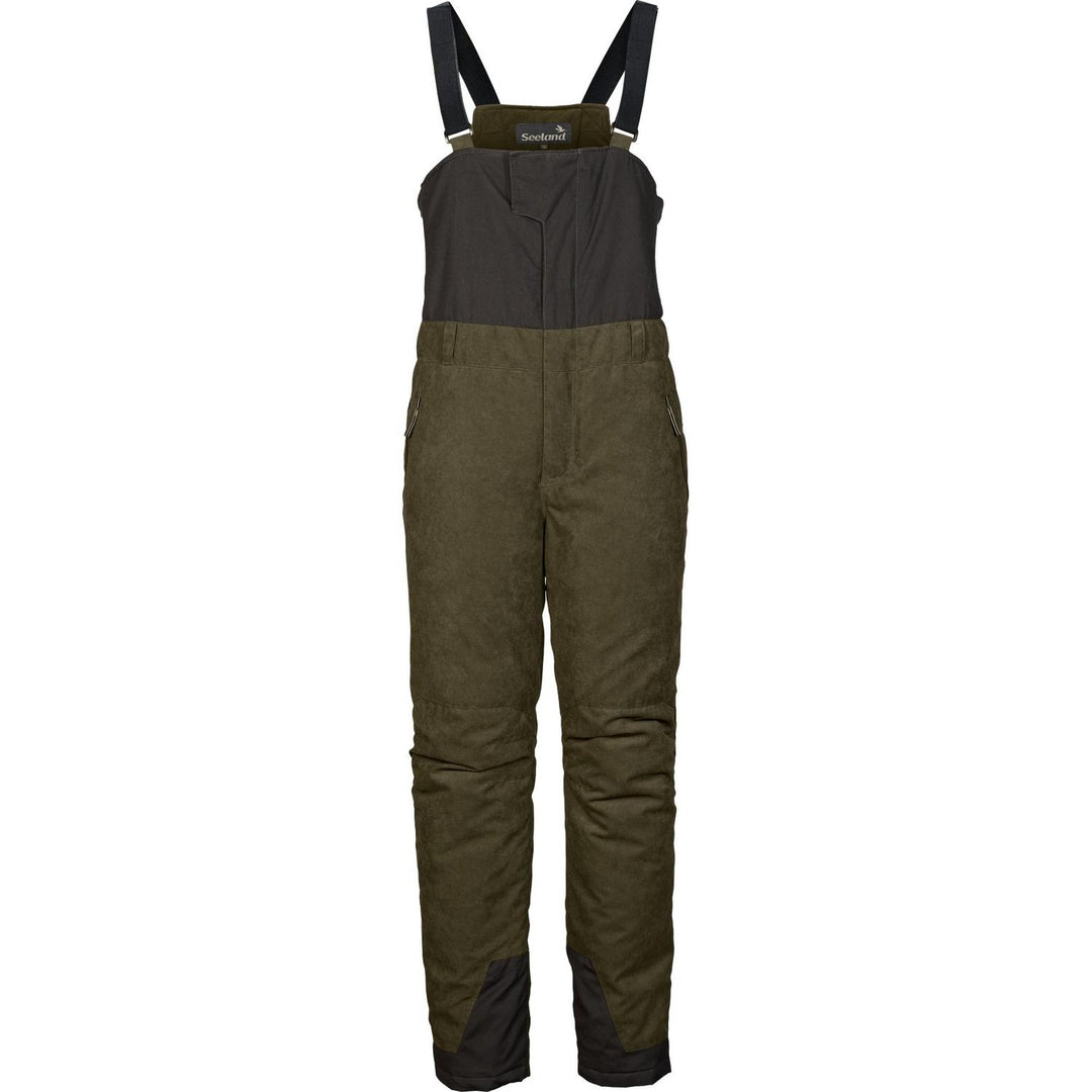 Seeland Taiga salopette-style trousers, front view of the olive green insulated trousers with black bib top and adjustable shoulder straps