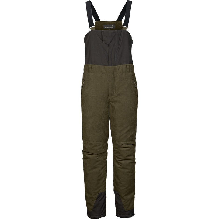 Seeland Taiga salopette-style trousers, front view of the olive green insulated trousers with black bib top and adjustable shoulder straps