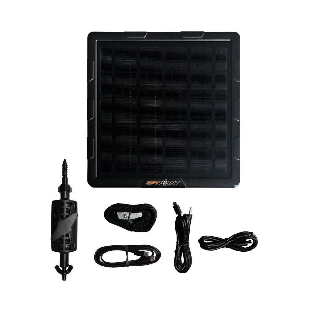 Spypoint SPLB-10 solar panel with its contents laid out: panel, mounting strap, tree screw and two charging cables